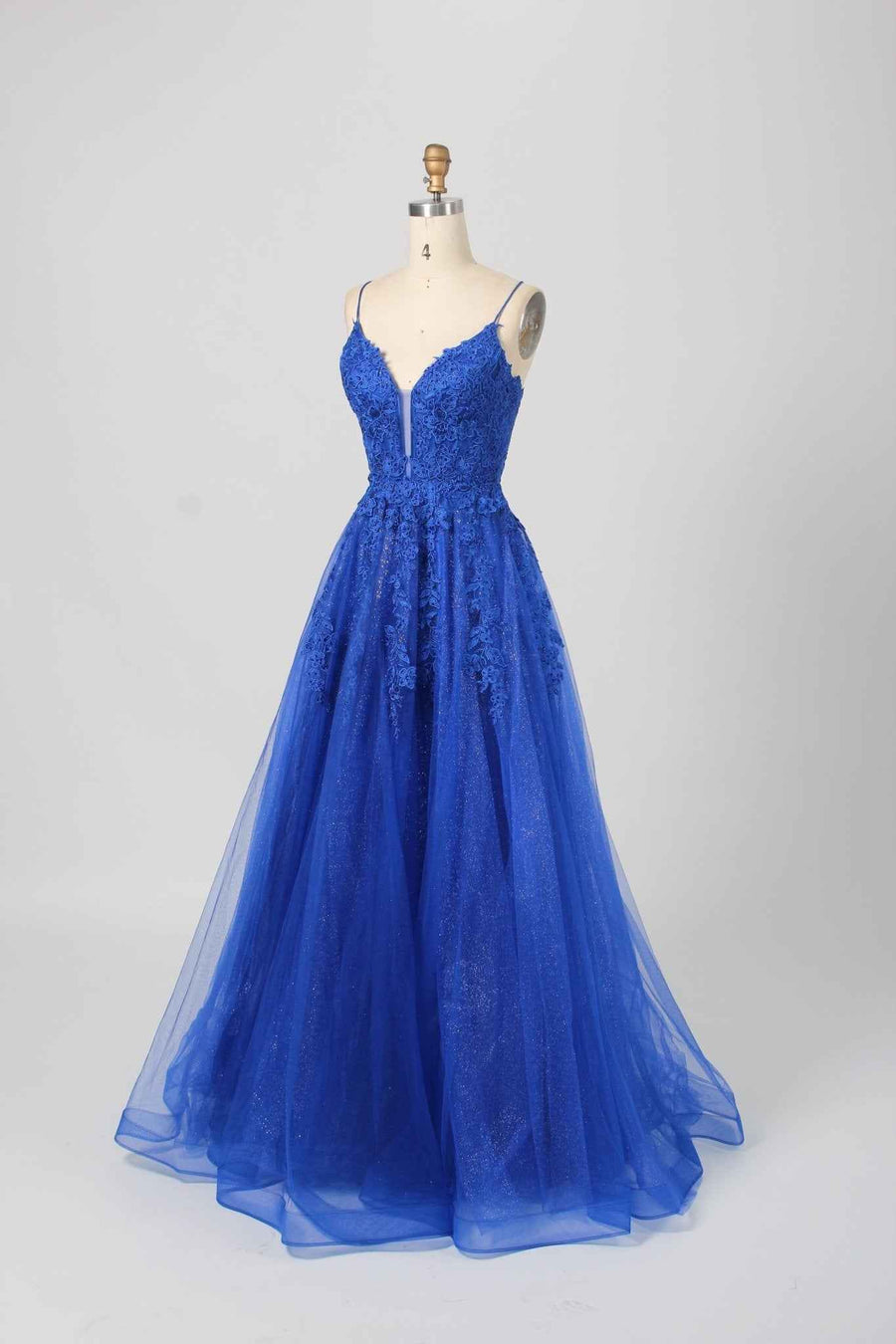 Side view of Joy Royal Blue Glitter Tulle Ballgown - Jessica Stuart, featuring lace bodice, glitter details, and voluminous layered tulle for formal occasions.