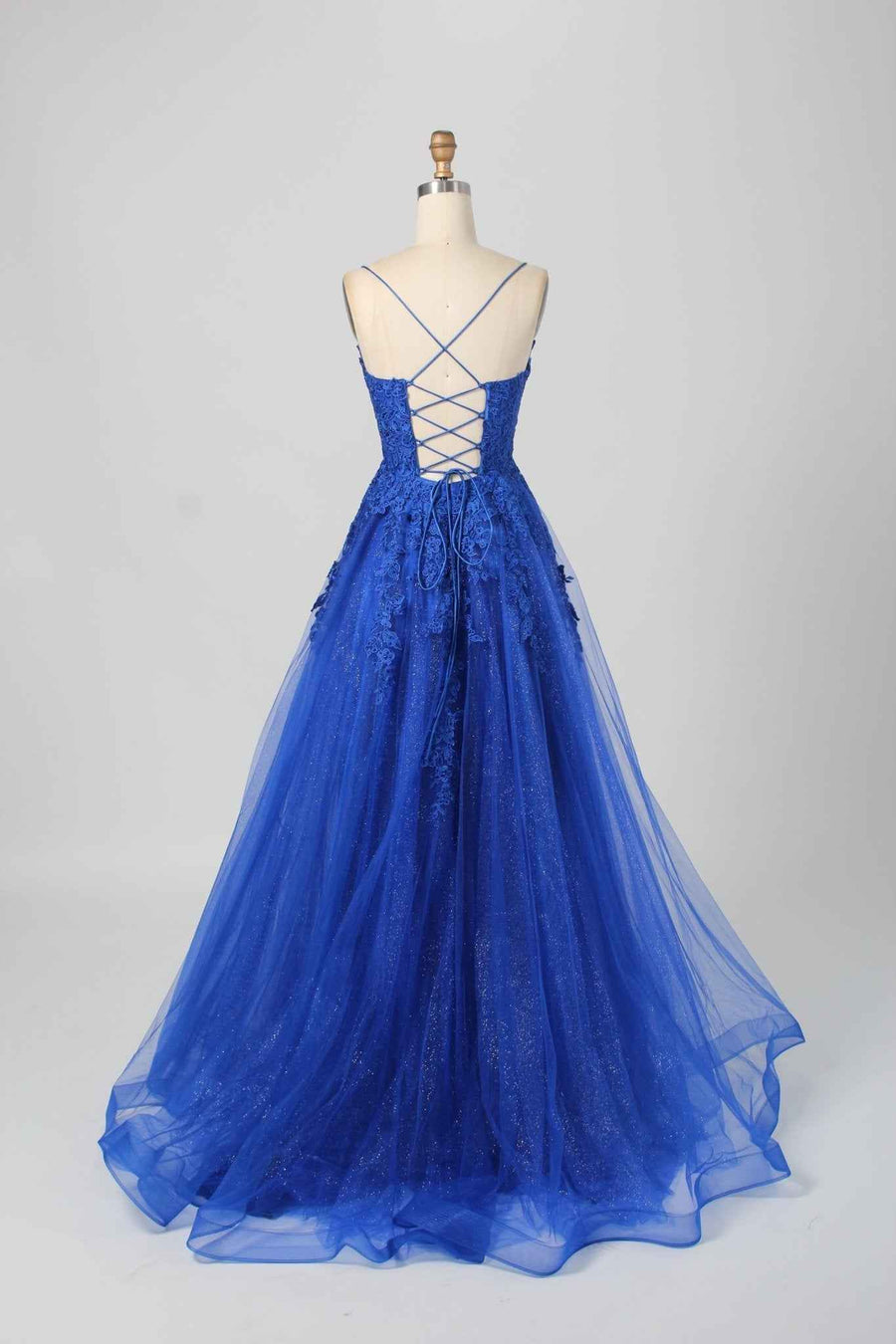 Back view of Joy Royal Blue Glitter Tulle Ballgown - Jessica Stuart with lace-up corset, crisscross straps, and glittery floral embroidery on tulle skirt.