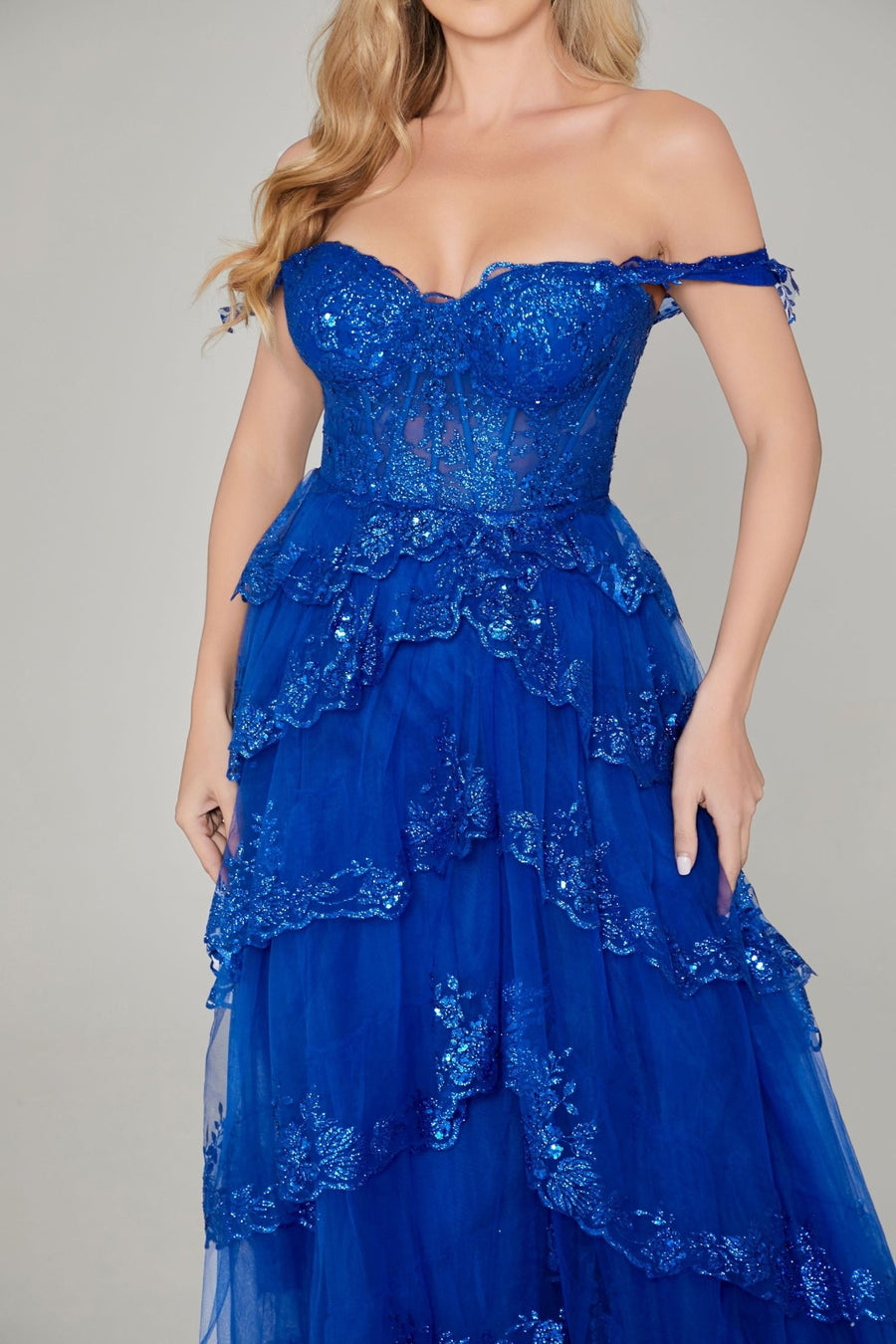 Chloe Lilac Glitter Dress - Off-Shoulder Prom gown in vibrant royal blue with lace appliques, sequin embellishments, and tiered glitter tulle layers.