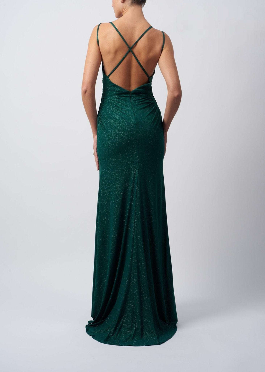 back view of model in a glitter blue dress