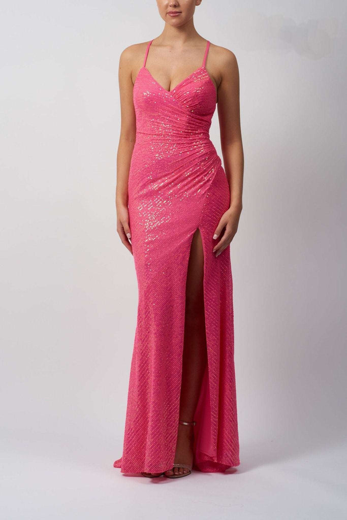 model in a hot pink long sequin mascara dress
