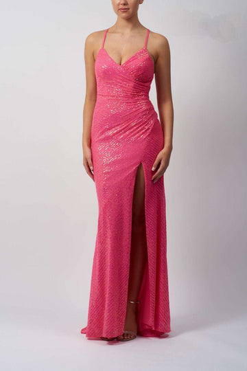model in a hot pink long sequin mascara dress