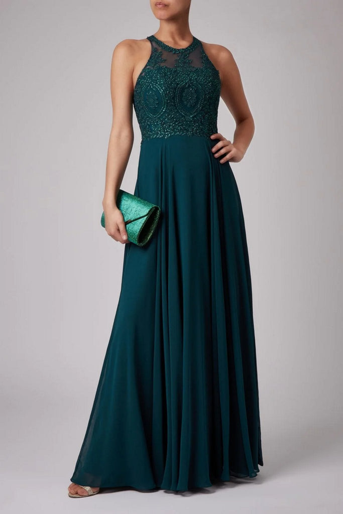 Young female standing in a Bottle Green Double lace strap dress