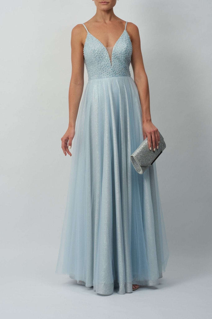 Model wearing Baby Blue Sparkle Tulle Prom Dress by Mascara London, front view