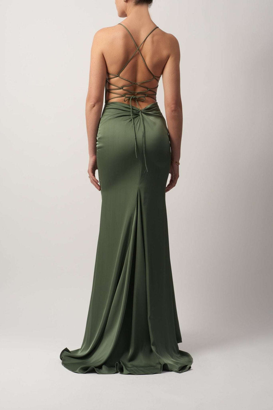 Young female standing in a Satin Low Back Strap Dress, back image