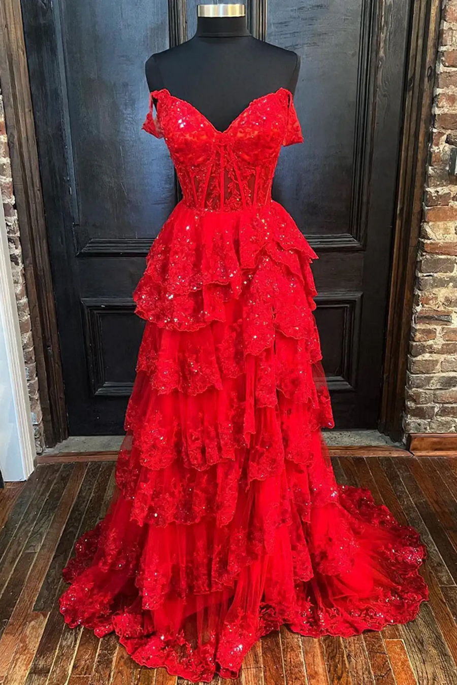 Chloe Red Glitter Off-the-Shoulder Prom Dress by Jessica Stuart features layered tulle ruffles, sequin embellishments, and lace appliques for prom 2024.