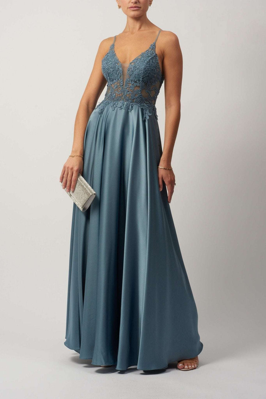 Young female standing in a Dew embroidered Satin Dress