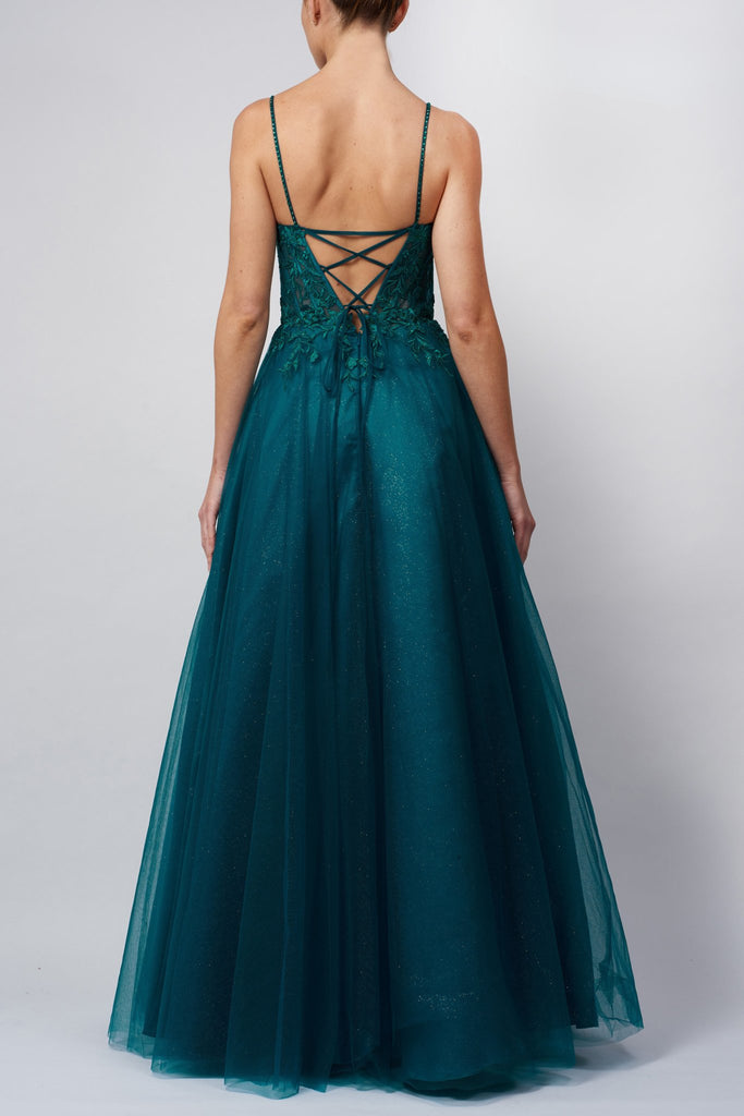 back view of girl in green dress