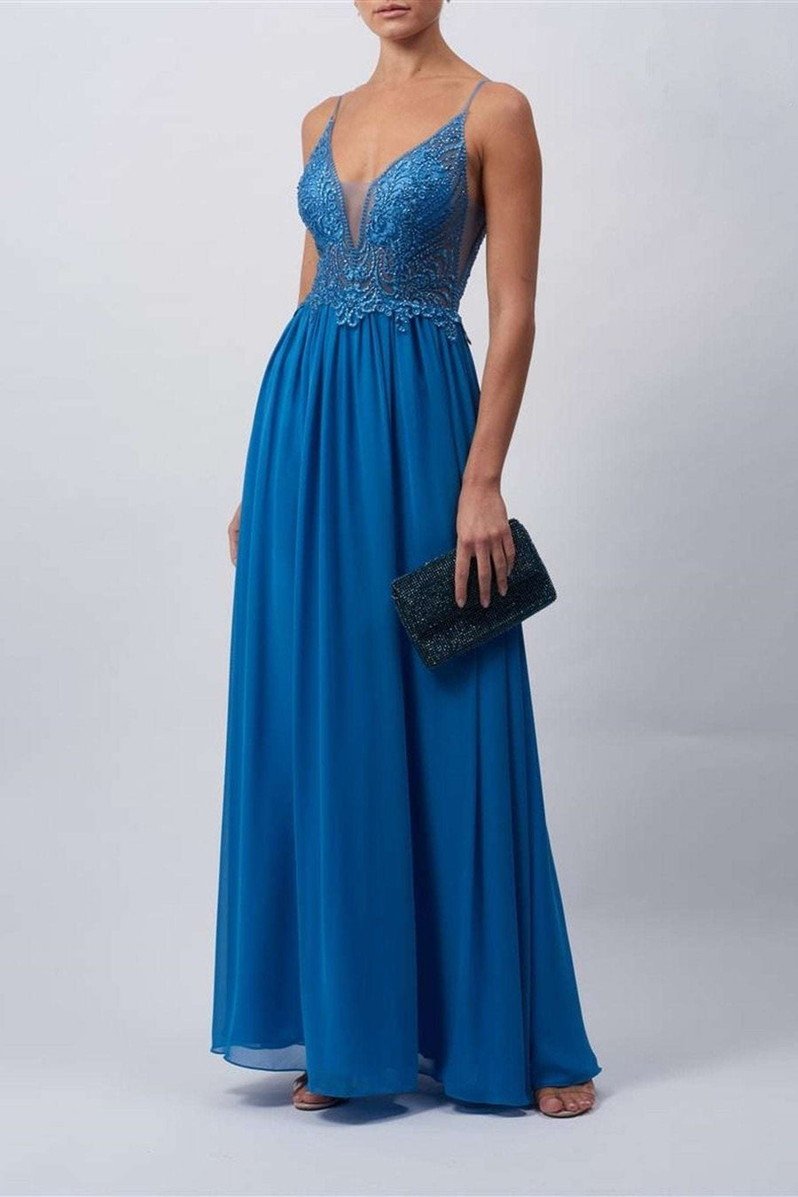 Young female standing in a Steele Blue Embroidered Plunge Dress