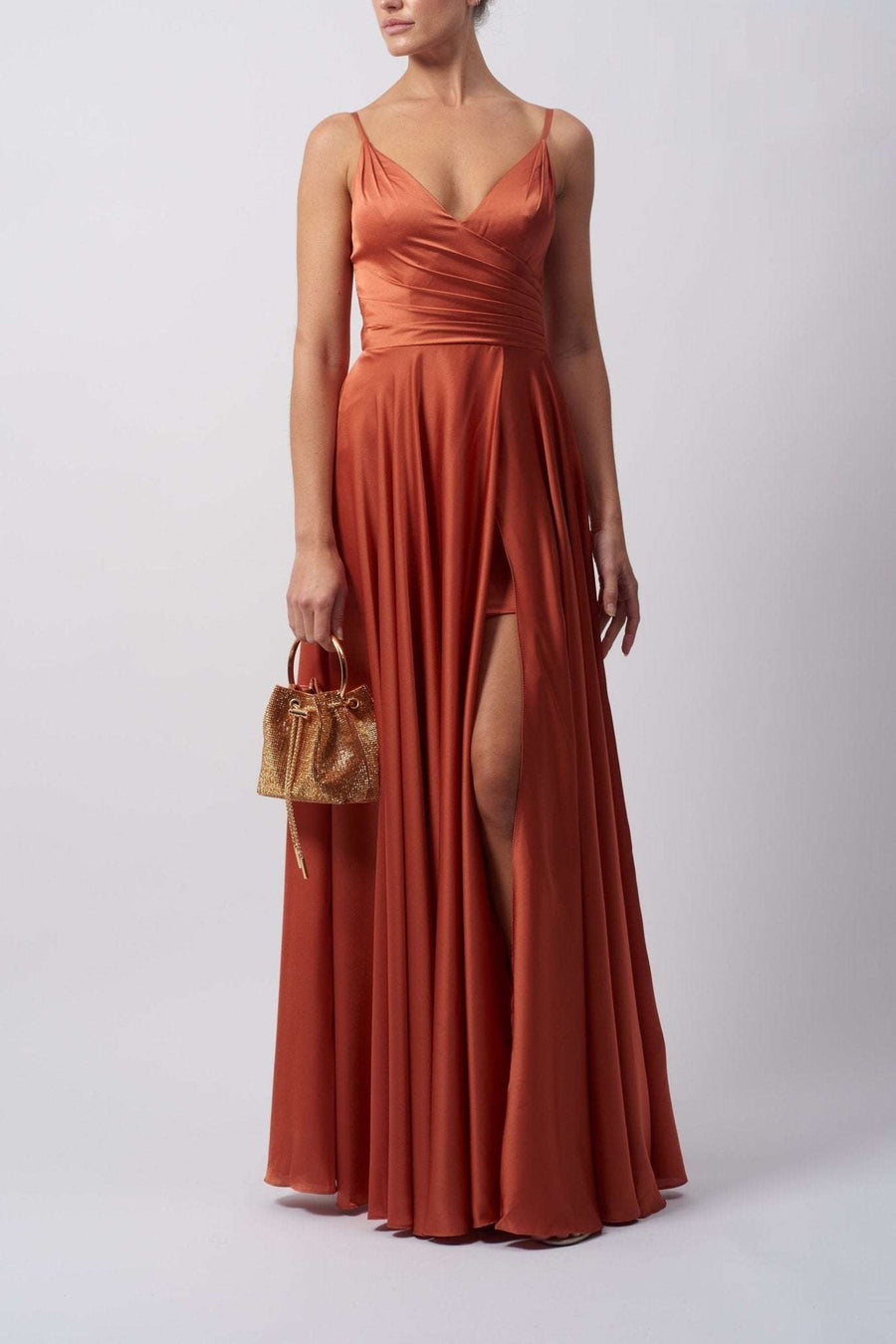 Young female standing in a Tobacco Satin Pleat Prom Dress