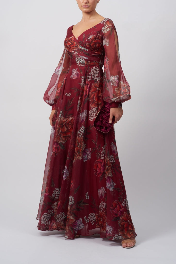 Young lady standing in a wine Floral Long Sleeve Dress
