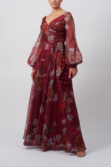 Young lady standing in a wine Floral Long Sleeve Dress